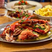 Whole lobster, simply cooked in garlic butter.