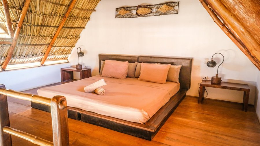 The bedroom on the second level is a Nicaraguan dream come true