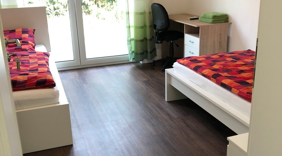 Zweibettzimmer mit Terrasse