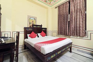 Hotel Baba Haveli in Jaipur, image may contain: Bed, Furniture, Hotel, Bedroom
