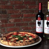 Our house branded wines pair beautifully with our Wood Oven Pizza.