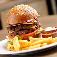 Morning Star Cafe Hamburger (with an extra patty). This is place is a little hard to find (it is underneath a Church..Cornerstone Community Church). Best Hamburgers in Playa del Carmen!