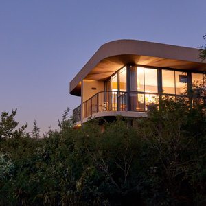 Thaba Eco Hotel in Johannesburg, image may contain: Villa, Lighting, Hotel, Grass