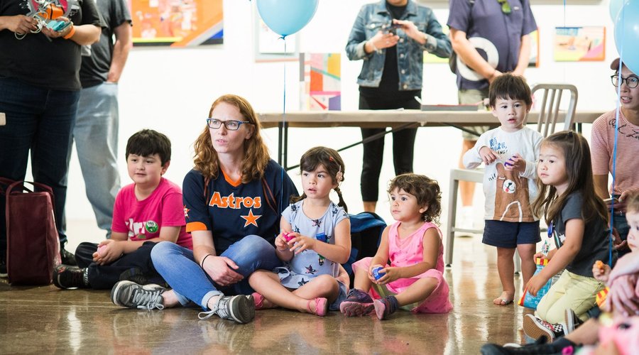 Artist Raul Gonzalez leads a storytelling activity at BSC's Spring Family Day.