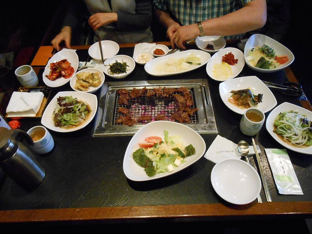 BBQ grill at our table, Amiso Korean Restaurant, Myeongdong District,  Jung-gu, Seoul. - Picture of Amiso, Seoul - Tripadvisor