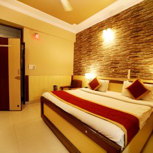  A serene and tranquil environment embraces you the moment you step into our Super Deluxe Room. The soothing palette and the excellent amenities make your stay no less than a royal one! The room comes with a queen bed, is centrally air-conditioned, has a TV, and provides 24-hour room and laundry services.