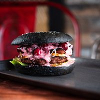 🔥 First hero is our signature burger
PATAREI (Estonian🇪🇪) . In order to have a true Estonian mind, this burger contains stewed cabbage and cranberries, which are accompanied by juicy beef, crispy bacon and smoked cheese.💣🍔The Burger bun is as black as the soil of our homeland.@patarei.burger