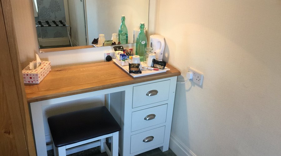 Room 6, King size bed, solid oak furniture and Laura Ashley style decor.