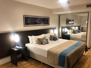 Caseros 248 Hotel in Cordoba, image may contain: Home Decor, Furniture, Bed, Lamp