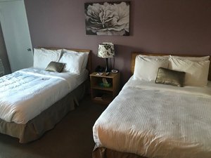Restland Motel in Clarenville, image may contain: Dorm Room, Furniture, Bed, Bedroom