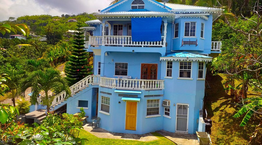 GreenzCove Apartments: Your family vacation home in Grenada, the Spice of the Caribbean. Beautiful, comfortable, practical & convenient accommodations. Offering two, 2 bedroom apartments. They are self-catering w/ free wifi. Conveniently located with easy access to public transport. Close to the city of St.George's, shops, beaches, attractions and more. Surrounded by fruit trees, flora & fauna. All in a quiet residential area giving you a truly local experience. Easy checkin with Smart Lock Code