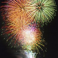This is a marine fireworks display adorning the sky and the Toba Bay.