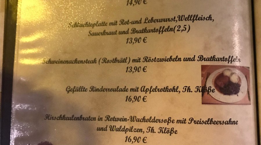 The menu is all German, but there some photos and the staff speaks decent English. Very quaint.