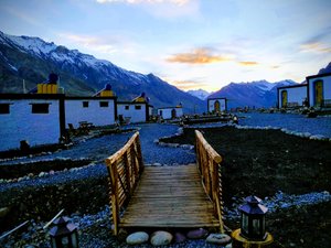 Spiti Village Resort in Kaza, image may contain: Waterfront, Scenery, Peak, Port