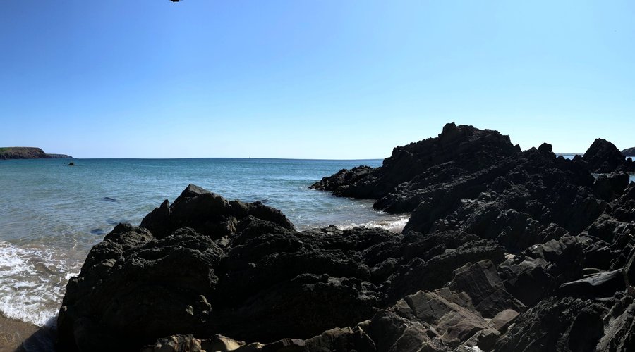 pano from rocks on the water line an hour before high tide.