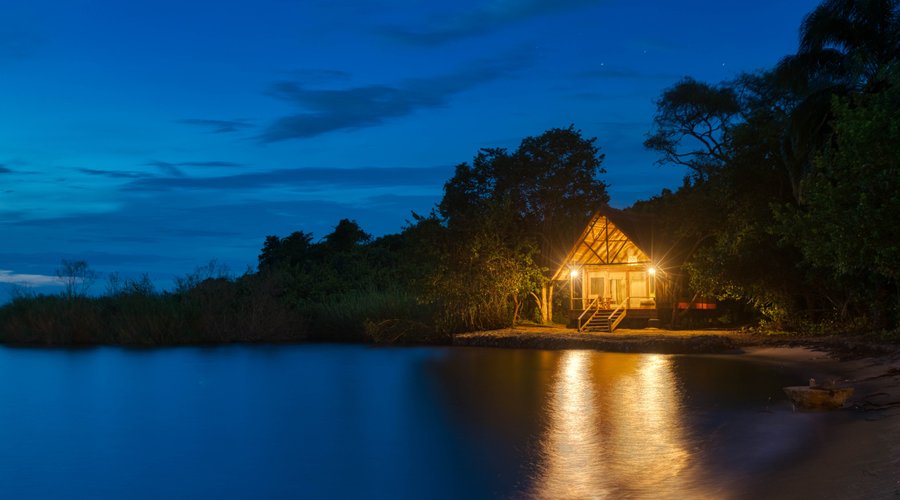 One of the guest rooms sitting on the beach front with views of Lake Tanganyika at Mahale Mountains National Park 