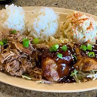 Combo plate with slow roasted $ pulled Kalua Pork and two thighs of Shoyu Chicken. Two scoops rice and one scoop of Mac salad