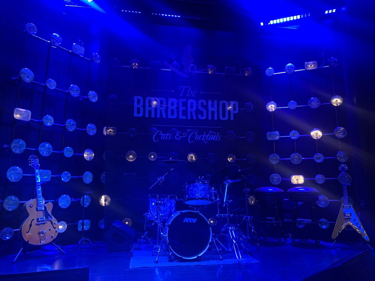 The Cosmopolitan of Las Vegas - The Barbershop Cuts & Cocktails is business  in the front, party in the back.