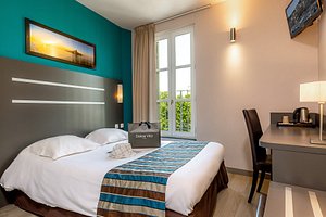 Hotel Terminus Saint Charles in Marseille, image may contain: Furniture, Bedroom, Handbag, Home Decor