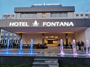 Hotel Fontana in Vrnjacka Banja, image may contain: Hotel, Fountain, Office Building, Person