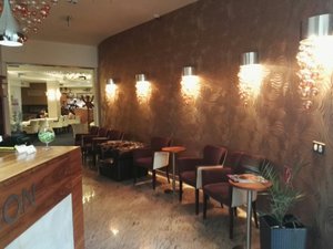 Hotel LOWE in Piestany, image may contain: Indoors, Chair, Restaurant, Plant