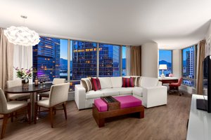 Auberge Vancouver Hotel in Vancouver, image may contain: Penthouse, Living Room, Dining Room, Dining Table