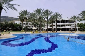 Gai Beach Hotel in Tiberias, image may contain: Hotel, Resort, Pool, Person