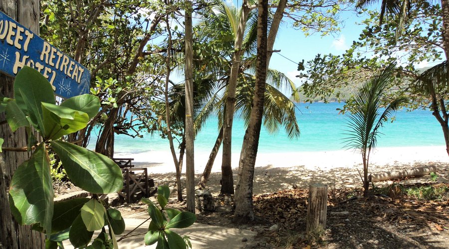 The Caribbean Sea and the soft sand of Lower Bay beach, a minutes walk away from you room!