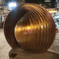In the Queens Street Mall 'Gestation' sculpture by Baile Oakes. This was restored in 2018 for the 30th Anniversary of World Expo 88