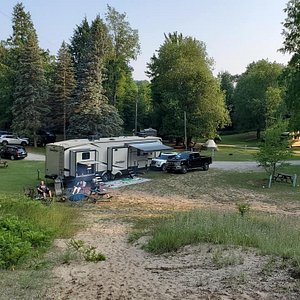 This is a photo from a small sand dune at the back of the grounds. The pool was very close, just out of sight from this photo to the right. Easy access and convenient to all campers.