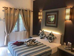 Tropical Resort Langkawi in Langkawi, image may contain: Lamp, Furniture, Bed, Home Decor