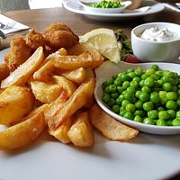 Scampi, chips, peas and salad.