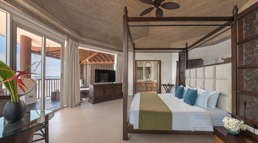 Our Water Villa Features 180 degrees undisputed view of the ocean, outdoor jacuzzi and wooden deck. 