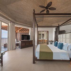 Our Water Villa Features 180 degrees undisputed view of the ocean, outdoor jacuzzi and wooden deck. 