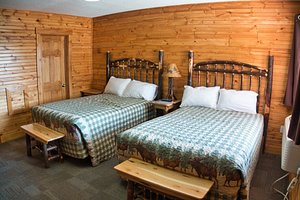 Outdoorsman Motel in Wawa, image may contain: Interior Design, Indoors, Hotel, Wood