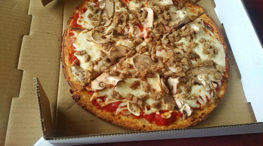 Small beef and mushroom pizza on cauliflower crust