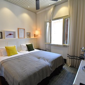 Market House - an Atlas Boutique Hotel in Tel Aviv, image may contain: Furniture, Bedroom, Indoors, Bed