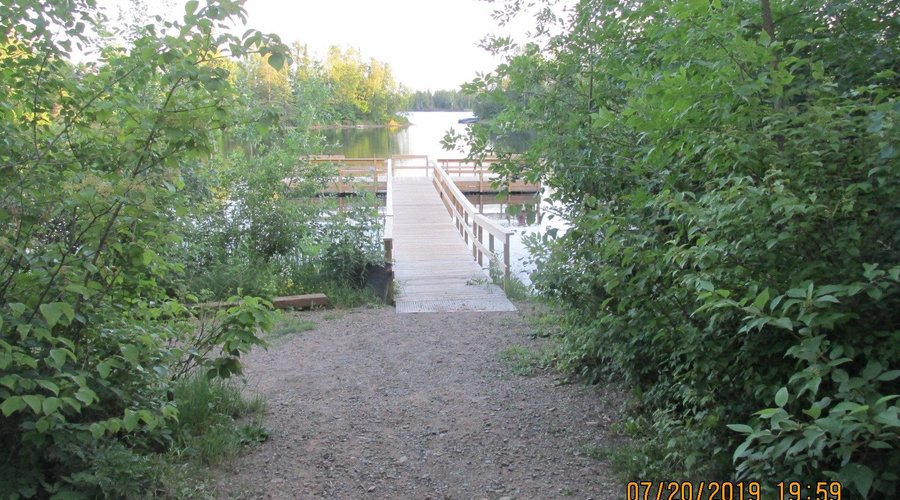 Enroute to newer fishing dock on quiet bay.