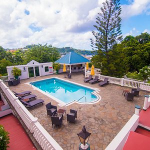 Grenadine House & Spa in St. Vincent, image may contain: Resort, Hotel, Pool, Plant