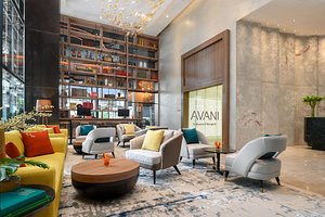 Avani Sukhumvit Bangkok Hotel in Bangkok, image may contain: Home Decor, Living Room, Indoors, Foyer