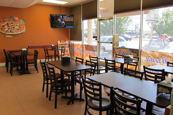 Pizza Xpress Dining Area ?w=600&h=400&s=1