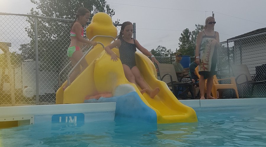 the shallower pool has this ducky slide as well as sprinklers for the kids