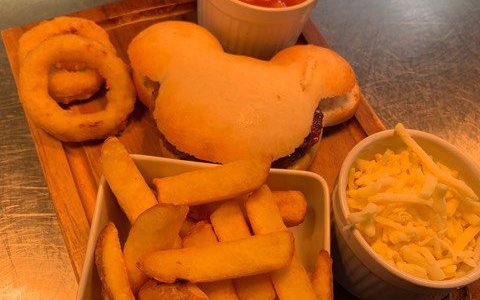 Mickey Mouse burger, chips, beans and onion rings