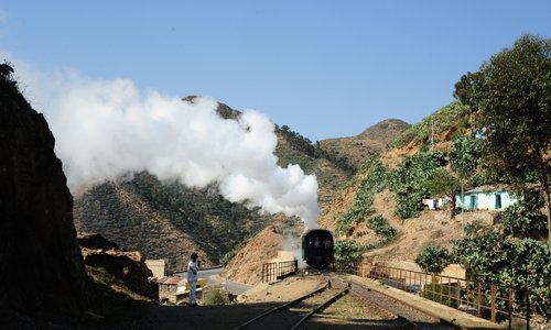 A riveting 19-century steam train excursion trip through the mountains from Asmara downhill to Nefasit and uphill back to Asmara with Africa’s oldest yet recently renovated railway.
 The spectacular ride on one of the oldest steam locomotives in existence in Africa, huffing and puffing along steep canyons, deep valleys and through dark tunnels is utterly thrilling. Traveling in one of these old-timers is as if you were in a big cinema hall with a wide screen in front of you.