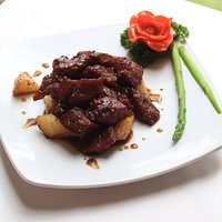 Beef cubes with squid sauce