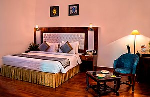 Hotel Park Ocean in Jaipur, image may contain: Interior Design, Furniture, Home Decor, Cushion