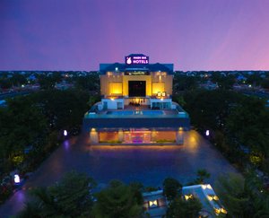 Hash Six Hotels in Coimbatore, image may contain: Hotel, Building, Lighting, Resort