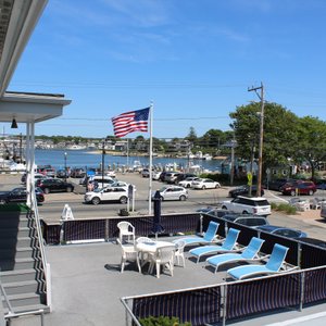 Overlooking Ocean Street Docks and Hyannis Harbor, island ferries just a few steps away.