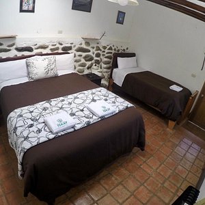 Hostal Iskay in Ollantaytambo, image may contain: Bed, Furniture, Chair, Hotel