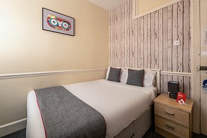 OYO Pier Hotel Rhyl in Rhyl, image may contain: Interior Design, Indoors, Dorm Room, Furniture